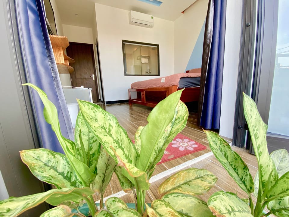 Deluxe Double Room, 1 Queen Bed, Balcony, City View | Minibar, desk, blackout drapes, soundproofing
