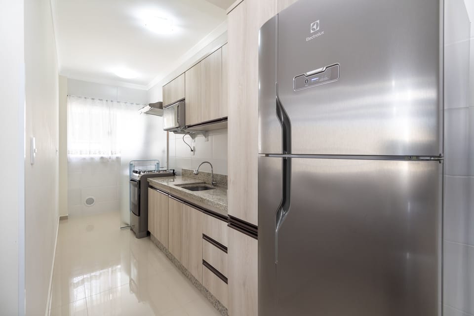 Apartment | Private kitchen | Full-size fridge, microwave, stovetop, cookware/dishes/utensils