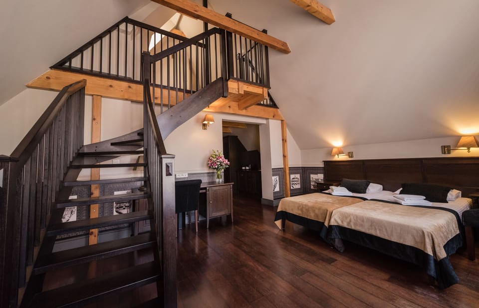 Family Apartment | Pillowtop beds, minibar, in-room safe, cribs/infant beds