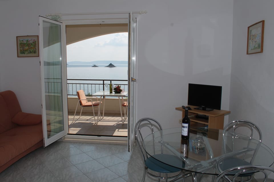 Panoramic Apartment, 1 Bedroom, Terrace | Living area | Flat-screen TV