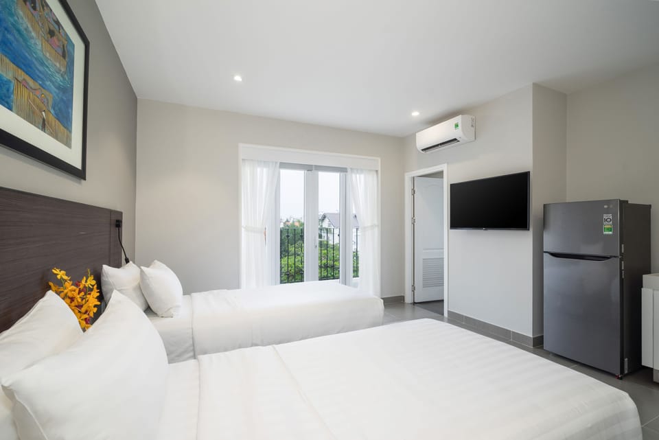 Family Suite Balcony | In-room safe, desk, soundproofing, iron/ironing board