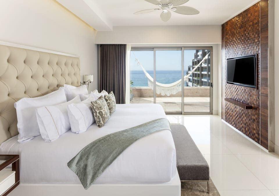 Premium bedding, memory foam beds, free minibar, in-room safe