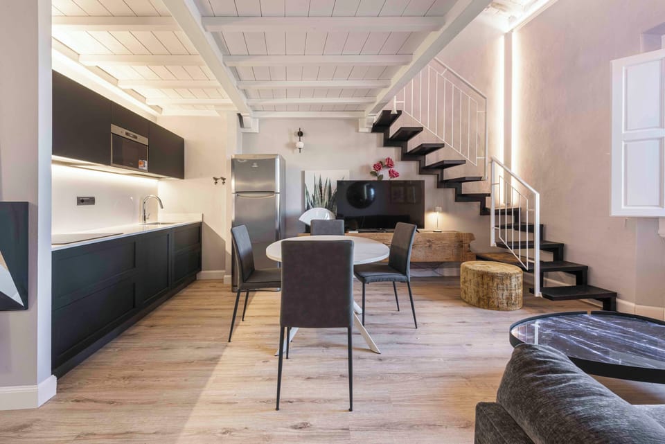 Apartment, 4 Bedrooms | Living area | Flat-screen TV