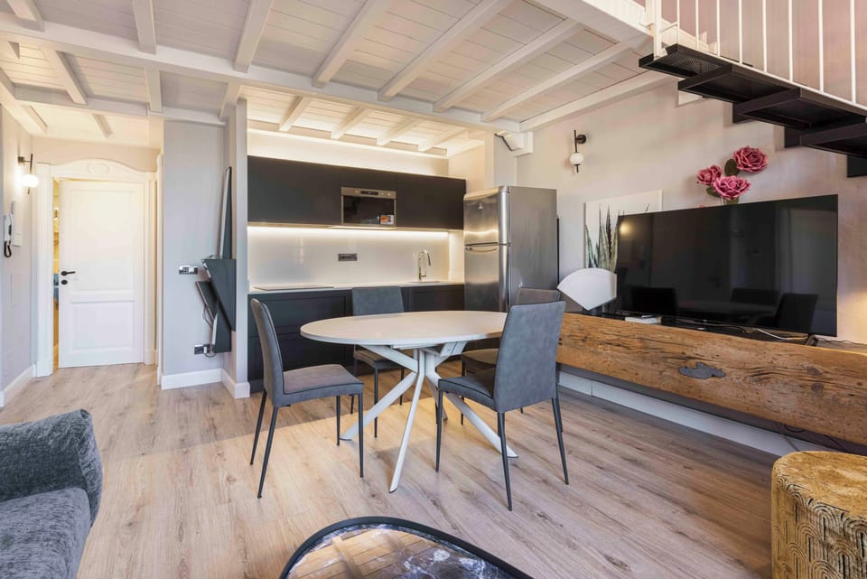 Apartment, 4 Bedrooms | Living area | Flat-screen TV