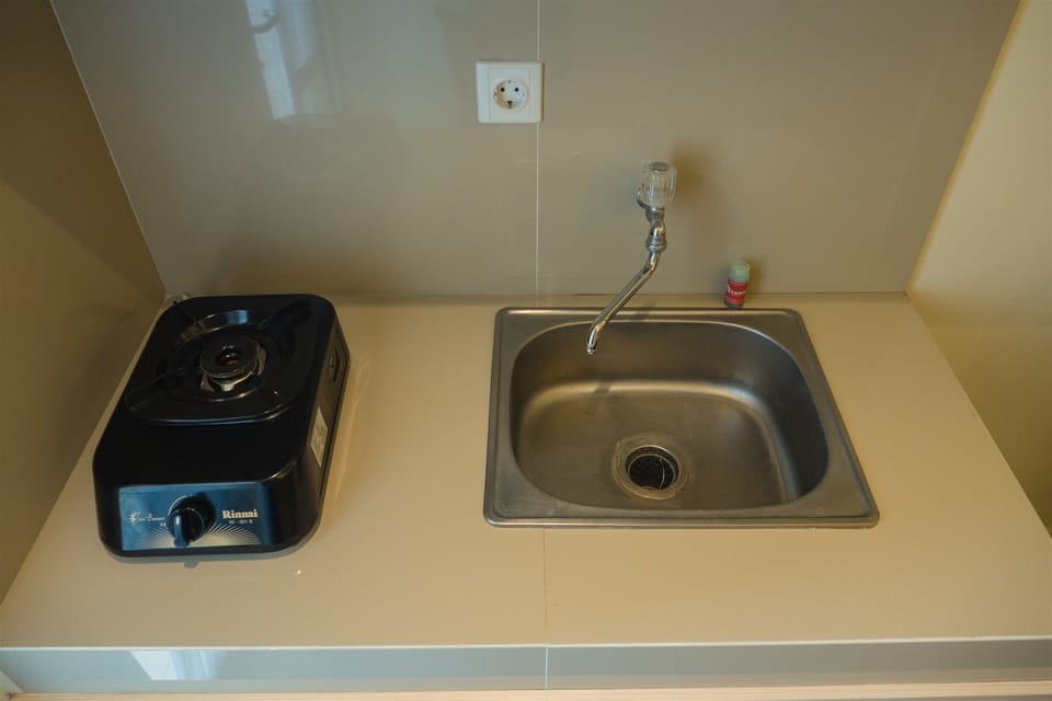 Room | Private kitchenette | Fridge, stovetop, rice cooker, cookware/dishes/utensils