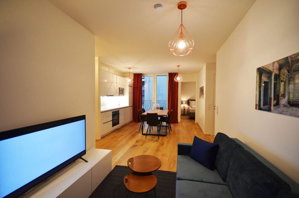Premium Apartment | Living area | Flat-screen TV
