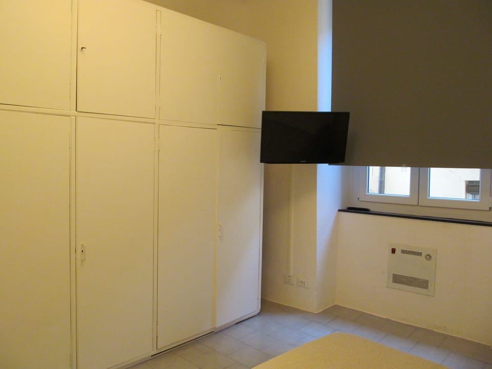 Room, 1 Large Twin Bed, Shared Bathroom | Desk, blackout drapes, iron/ironing board (on request), WiFi (free)