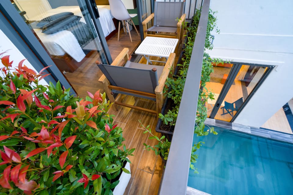 Deluxe Room, Balcony, Pool View | Balcony view