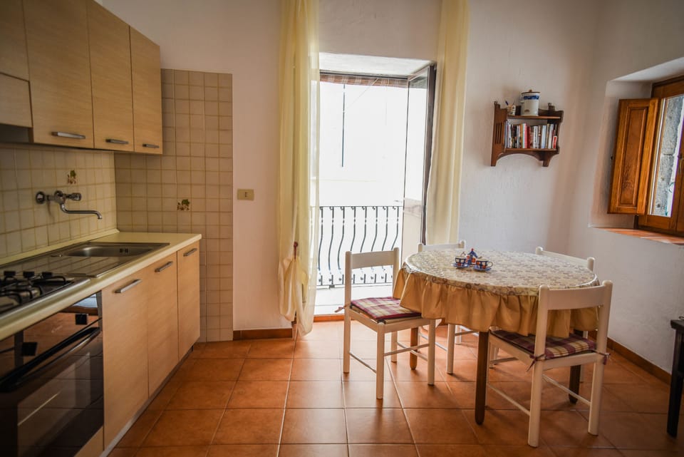 Double Room, Balcony | Private kitchenette | Full-size fridge, stovetop, coffee/tea maker, cookware/dishes/utensils