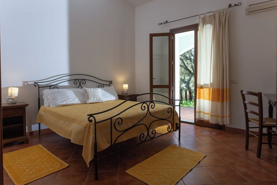 Double or Twin Room, Garden View | Down comforters, desk, blackout drapes, iron/ironing board