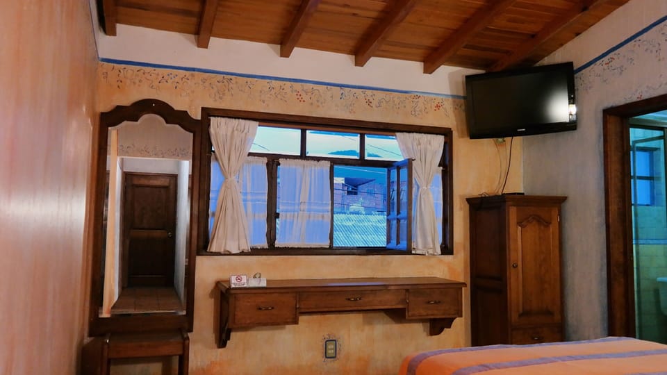 Design Room, Non Smoking, City View | Down comforters, individually decorated, individually furnished
