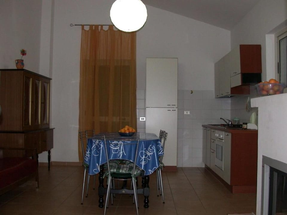 Full-size fridge, microwave, stovetop, cookware/dishes/utensils