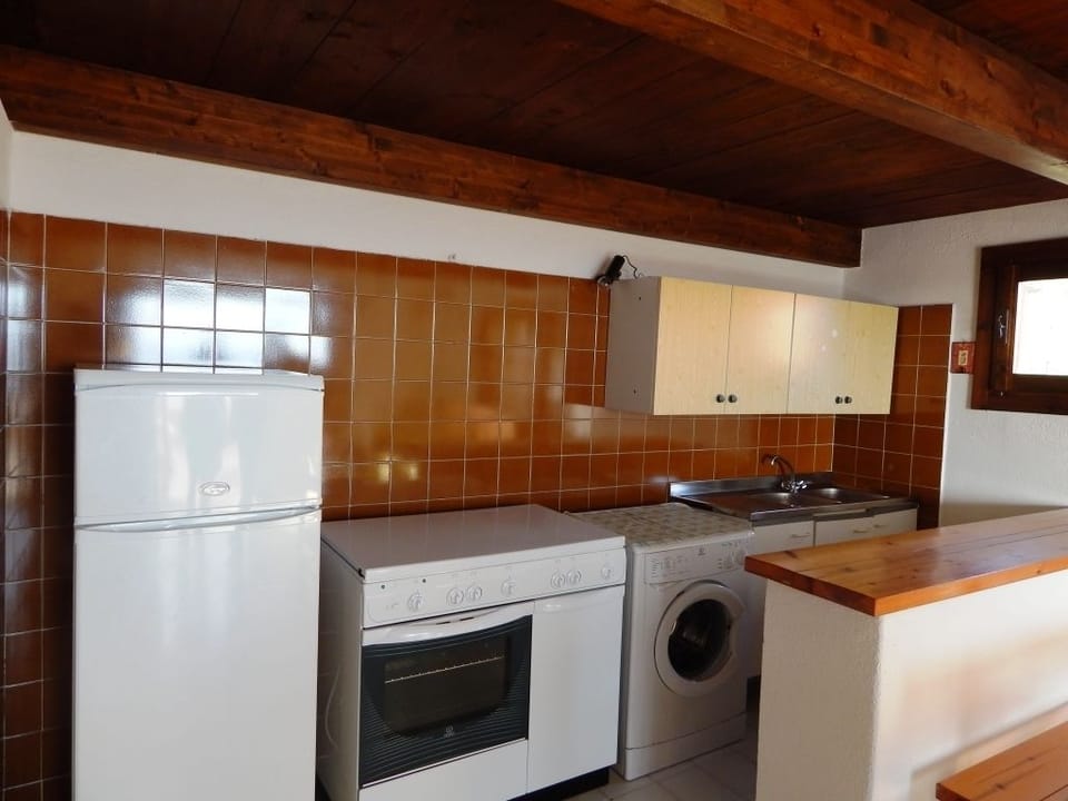 Apartment, 2 Bedrooms | Private kitchenette | Full-size fridge, stovetop, cookware/dishes/utensils