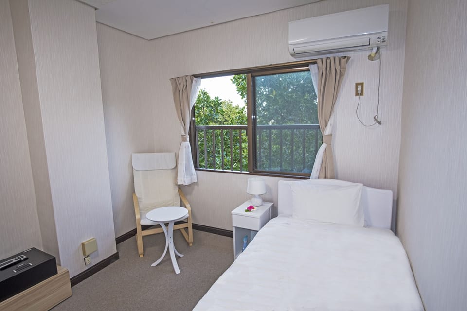 Comfort Single Room, 1 Twin Bed, Non Smoking, Mountain View | In-room safe, desk, blackout drapes, iron/ironing board