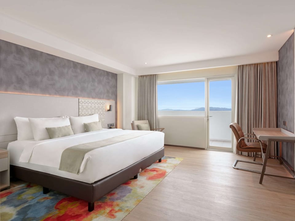 Grand Deluxe Room - 1 Queen Bed - Balcony - Sea View | In-room safe, desk, blackout drapes, iron/ironing board (on request)