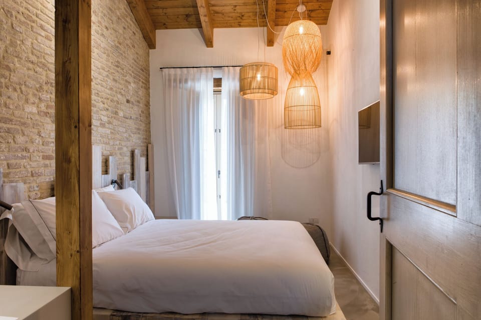 Family Quadruple Room | Minibar, in-room safe, desk, soundproofing