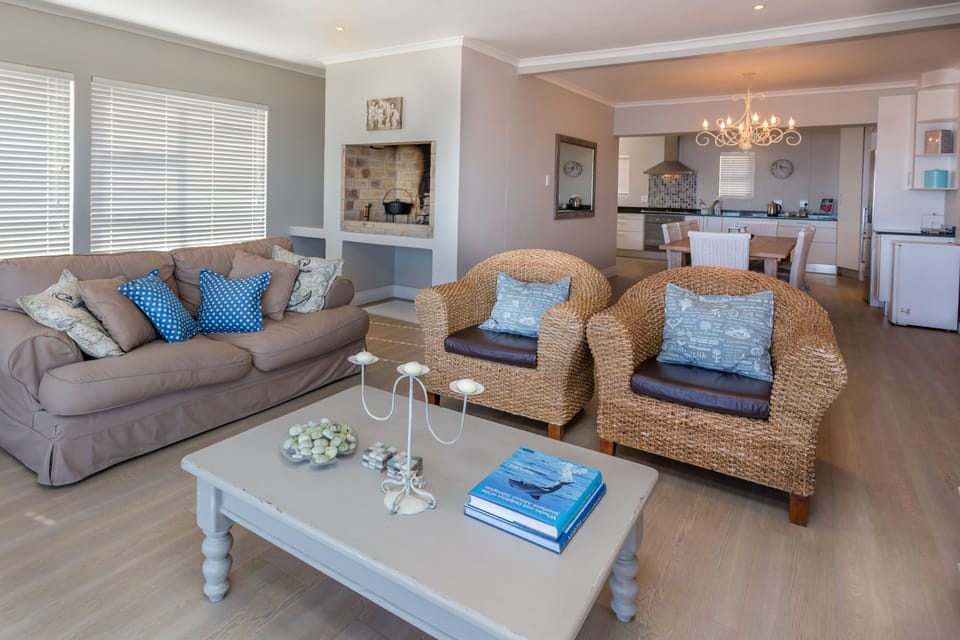 Superior House, 4 Bedrooms, Sea View, Oceanfront | Living area | 50-inch flat-screen TV with satellite channels, TV, fireplace