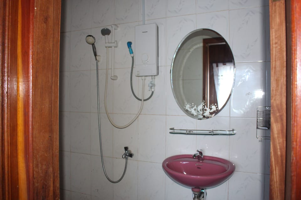 Shower, free toiletries, slippers, towels