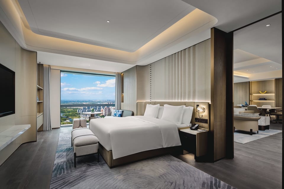 Suite, 1 Bedroom (Dining Area) | In-room safe, desk, laptop workspace, blackout drapes