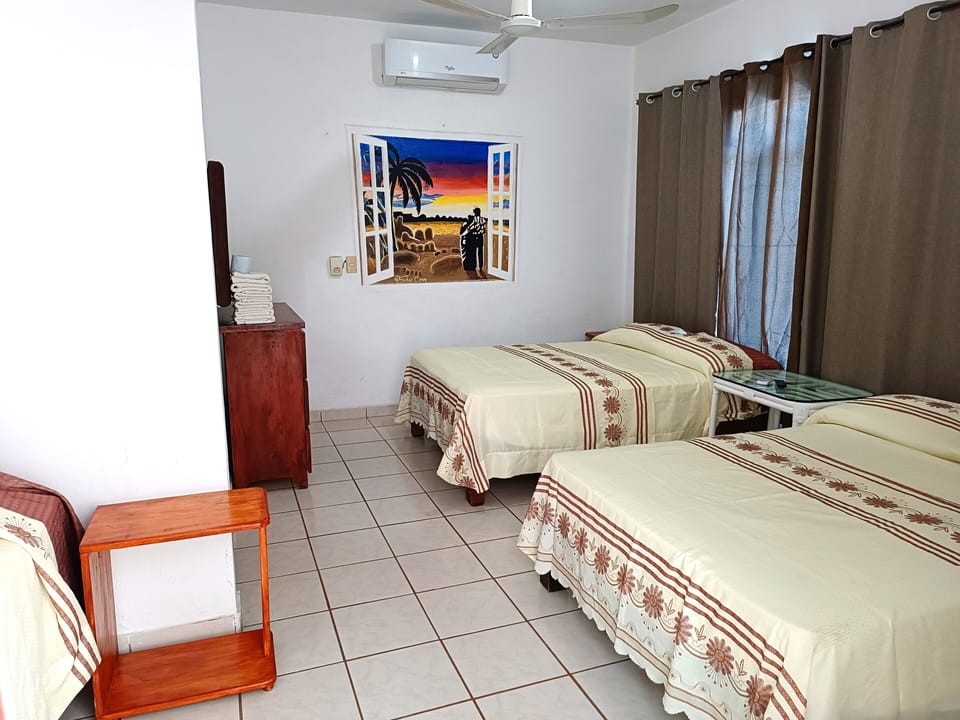 Family Room, Multiple Beds, Non Smoking, Pool View | 3 bedrooms, desk, free WiFi, bed sheets