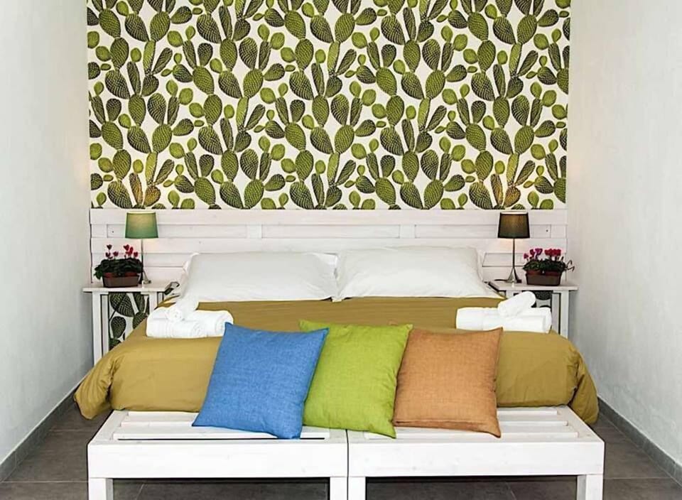 Deluxe Room, Sea View (Patio) | 1 bedroom, minibar, in-room safe, individually decorated