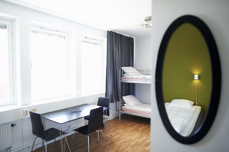Blackout drapes, soundproofing, iron/ironing board