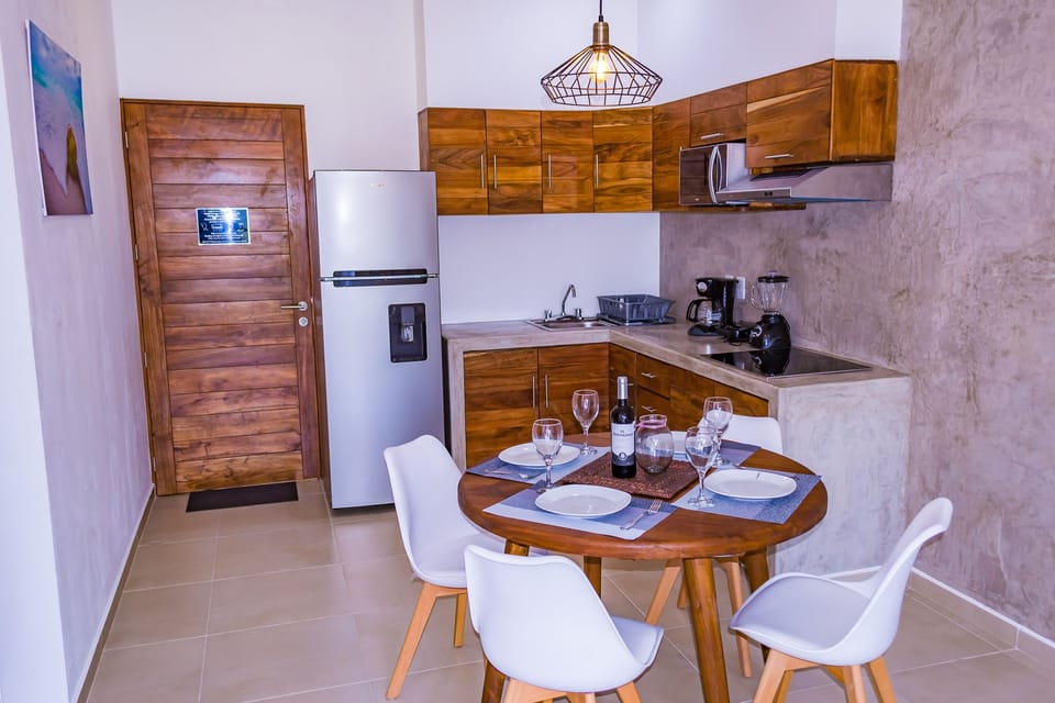 Superior Apartment, Multiple Beds, Non Smoking | Private kitchen | Full-size fridge, microwave, stovetop, cookware/dishes/utensils