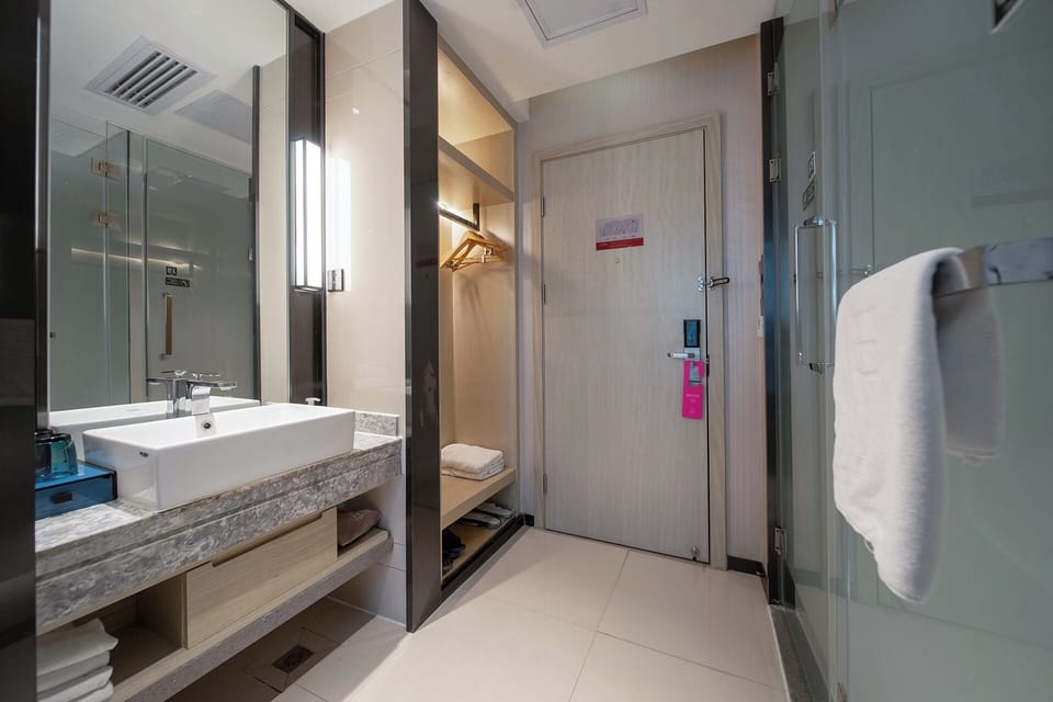 Shower, rainfall showerhead, eco-friendly toiletries, hair dryer