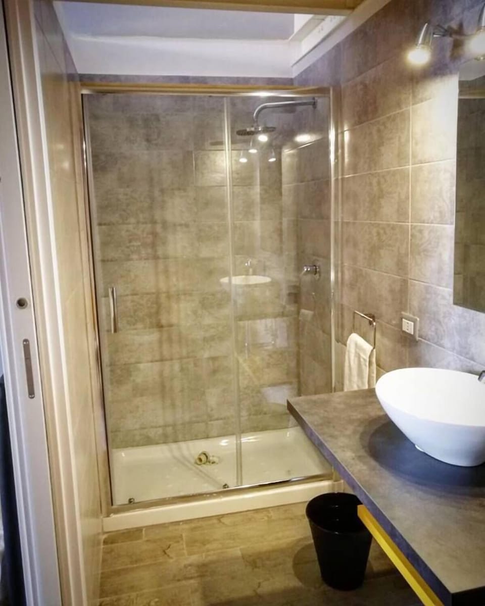 Shower, free toiletries, hair dryer, bathrobes