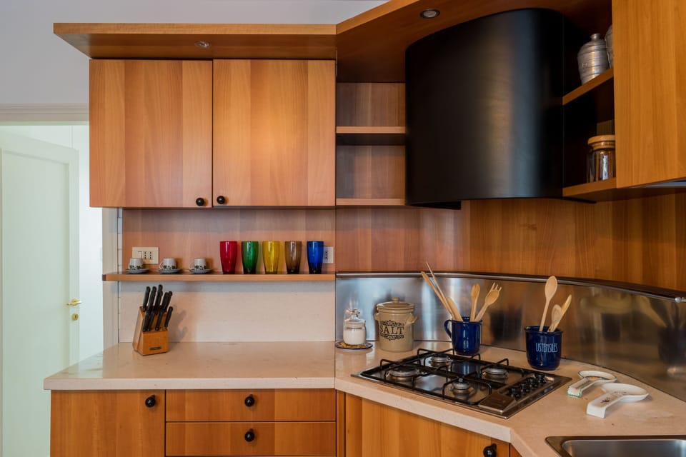 Family Apartment, 3 Bedrooms | Private kitchen | Full-size fridge, microwave, oven, stovetop