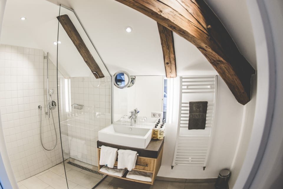 Panoramic Room | Bathroom | Deep soaking tub, hair dryer, bathrobes, towels