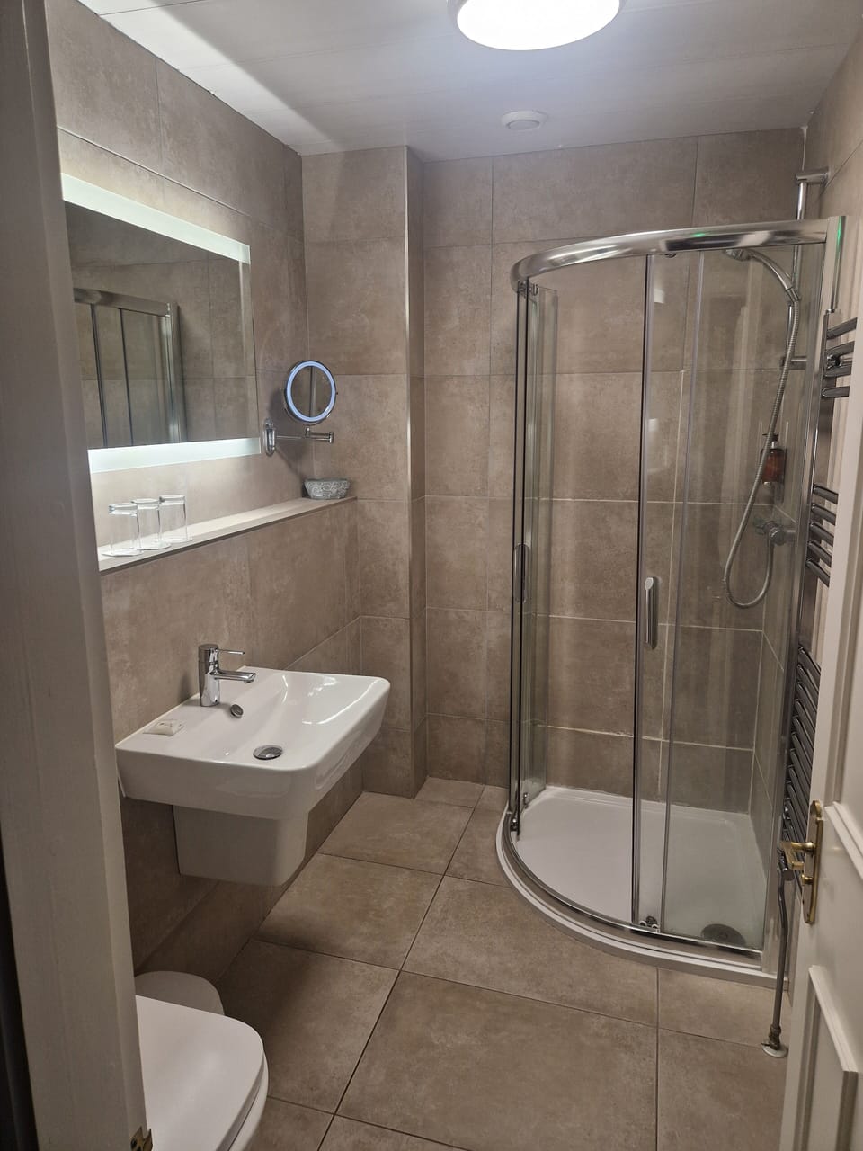 Shower, rainfall showerhead, eco-friendly toiletries, hair dryer