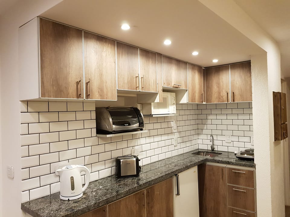 Apartment, 2 Bedrooms | Private kitchen | Fridge, oven, stovetop, coffee/tea maker