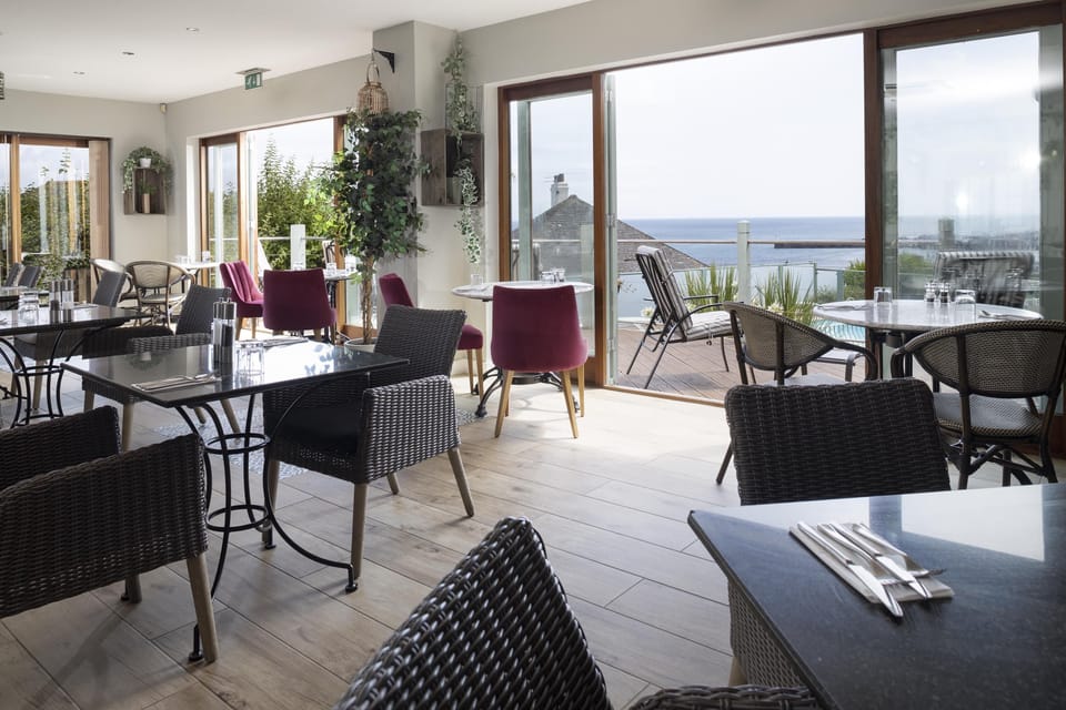 Breakfast, lunch, dinner served; Modern European cuisine, pool views 