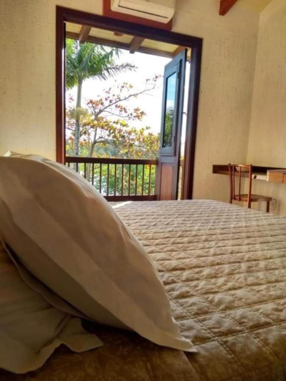 Deluxe Suite, Pool View | Premium bedding, minibar, desk, laptop workspace