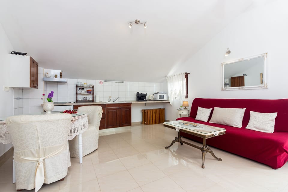 Studio, Pool View | Living area | Flat-screen TV