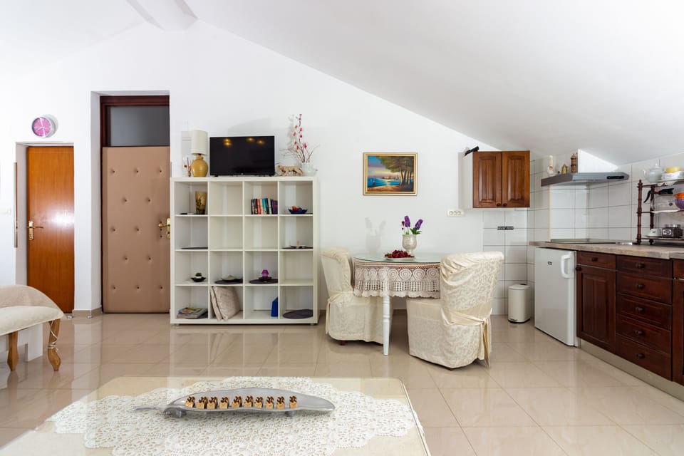 Studio, Pool View | Living area | Flat-screen TV