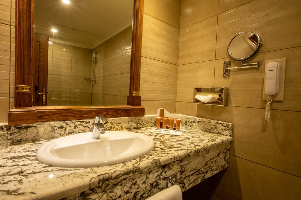 Superior Room | Bathroom | Bathtub, free toiletries, hair dryer, bathrobes