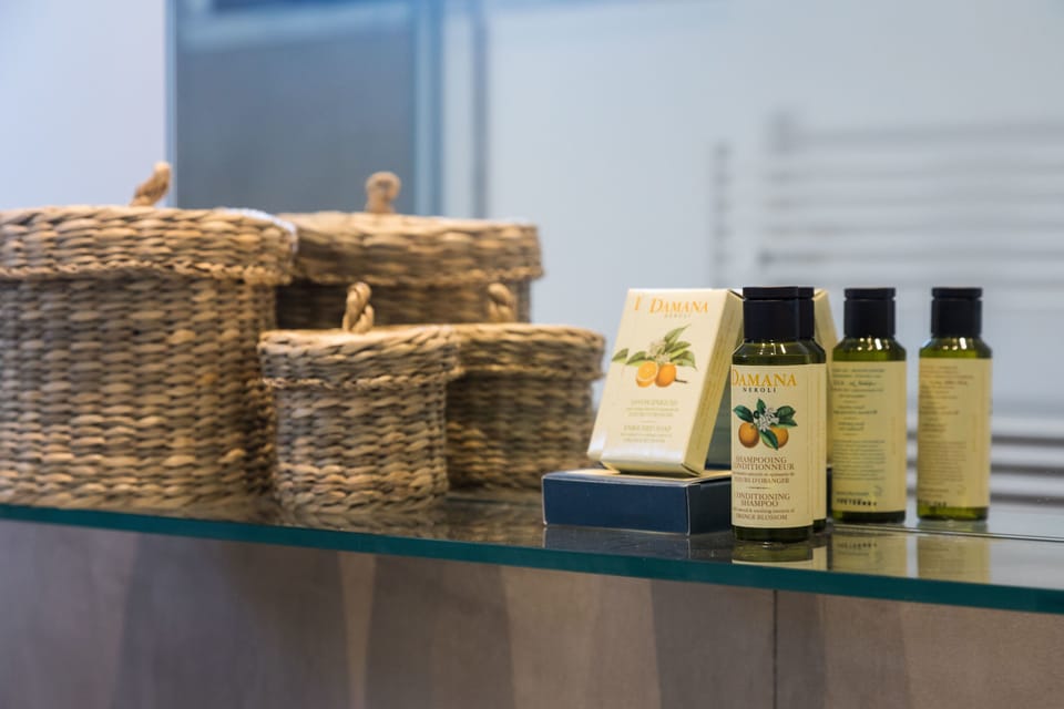 Junior Suite, 1 Queen Bed, Terrace, City View (Porta Felice A) | Bathroom amenities | Shower, eco-friendly toiletries, hair dryer, slippers