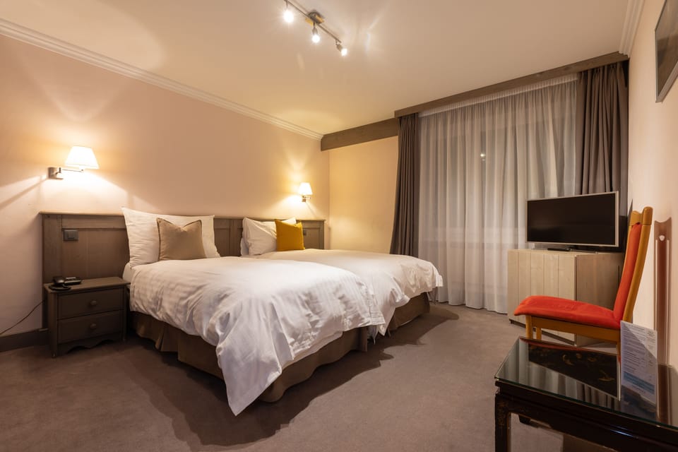 Apartment, 3 Bedrooms, 2 Bathrooms | Minibar, desk, blackout drapes, iron/ironing board