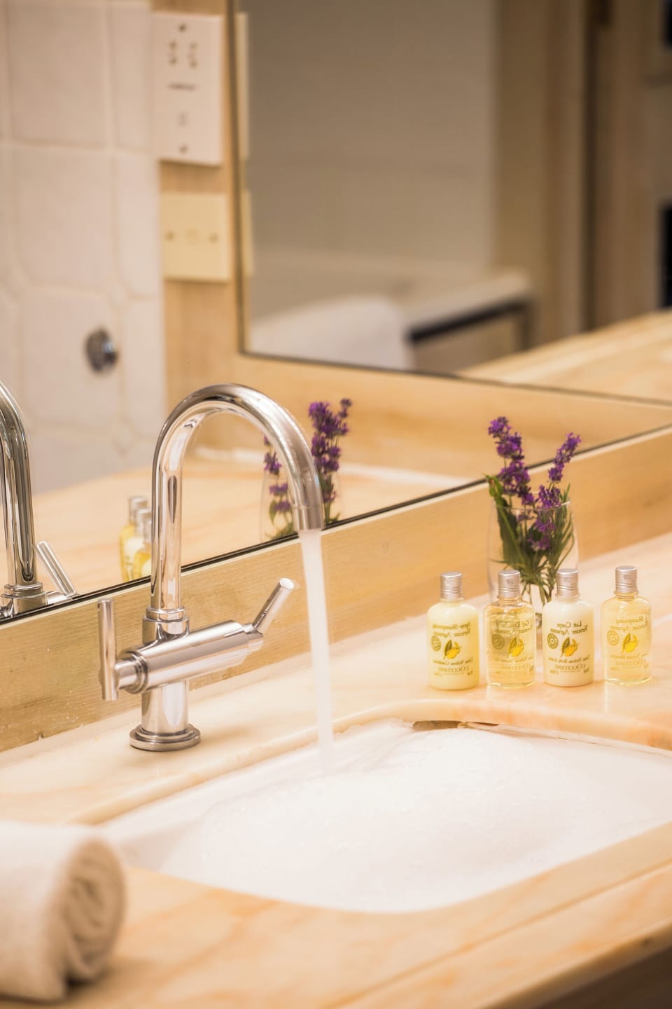 Designer toiletries, hair dryer, bathrobes, towels