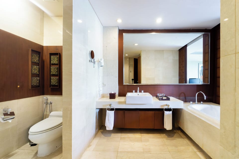 Separate tub and shower, free toiletries, hair dryer, slippers