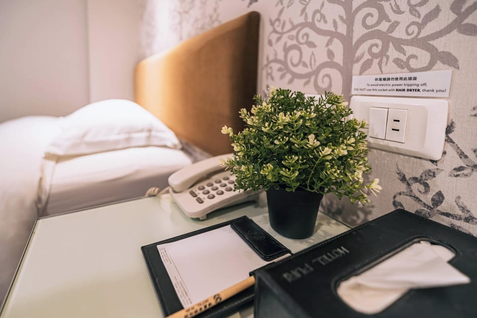 Triple Room | Down comforters, in-room safe, individually decorated, desk