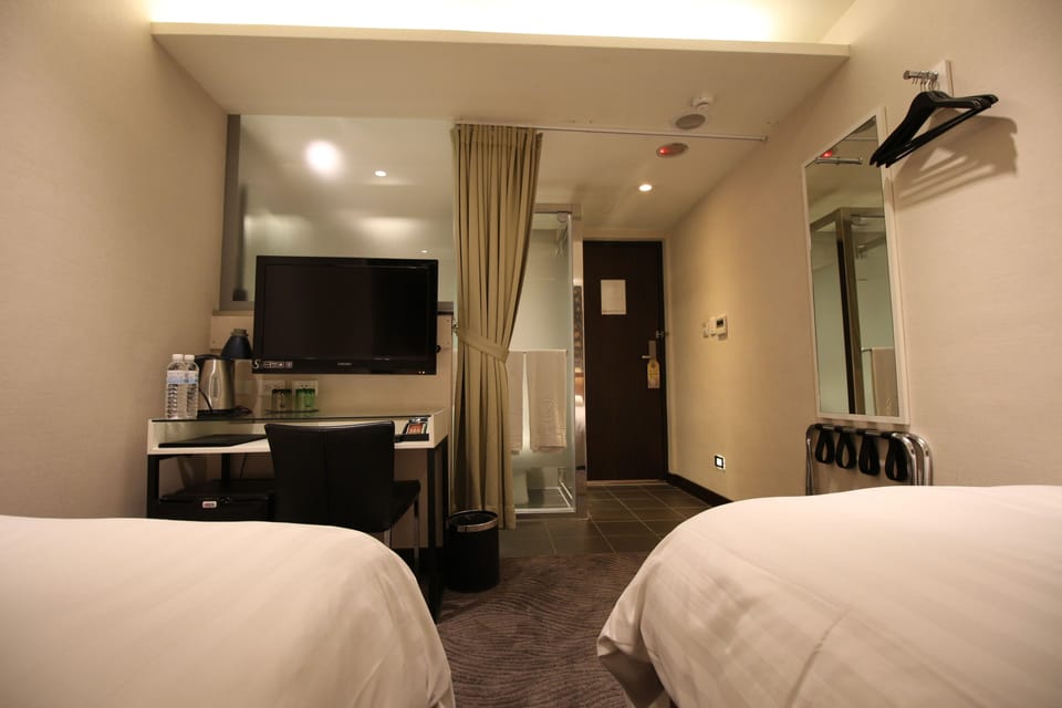 Economy Twin Room, 2 Twin Beds (No Window) | Down comforters, in-room safe, individually decorated, desk