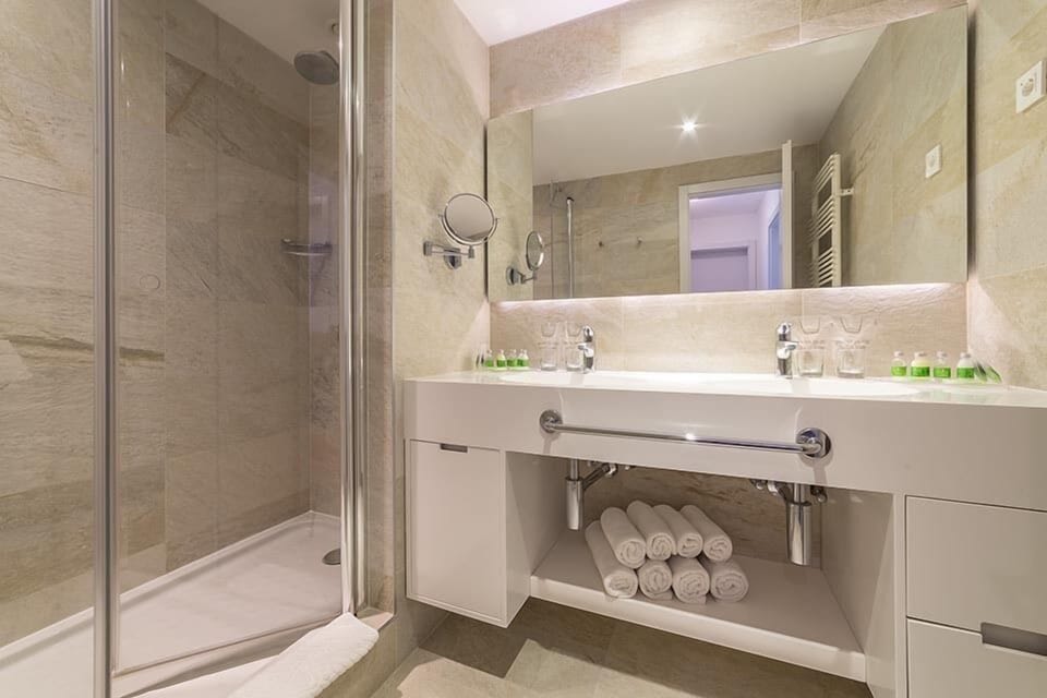Bathroom | Shower, free toiletries, hair dryer, bathrobes