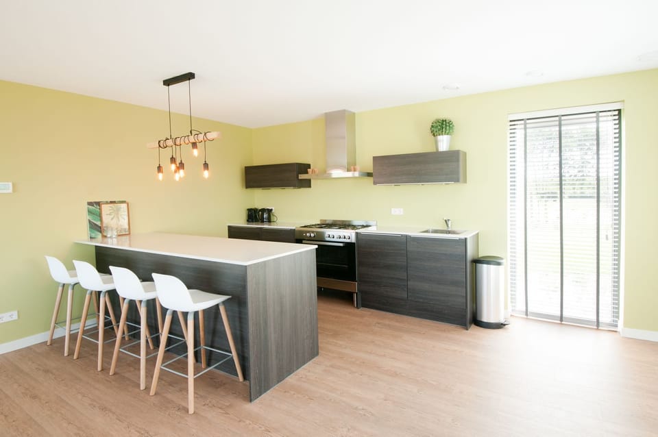 Villa Oesterdam | 10 personen | Living area | Flat-screen TV