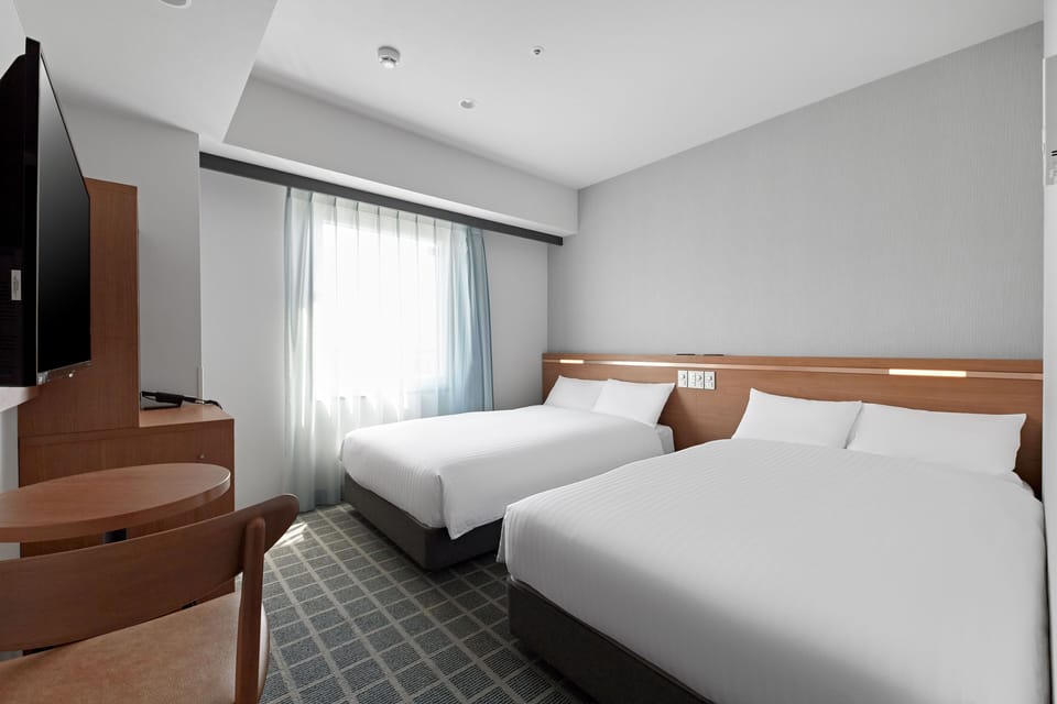 Twin Room, Non Smoking | Desk, blackout drapes, iron/ironing board (on request), WiFi (free)