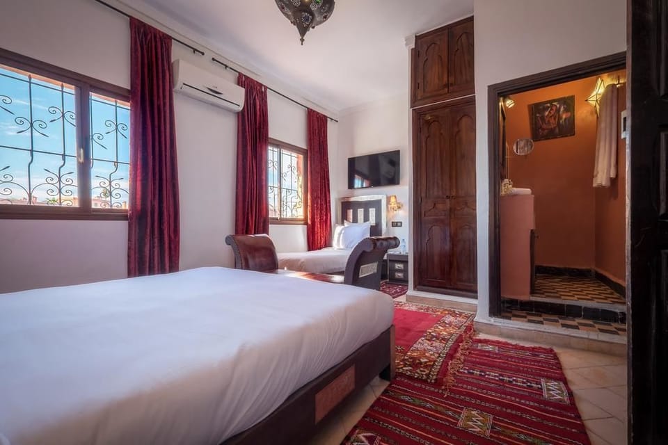 Superior Triple Room, Non Smoking | Blackout drapes, iron/ironing board, free WiFi, bed sheets