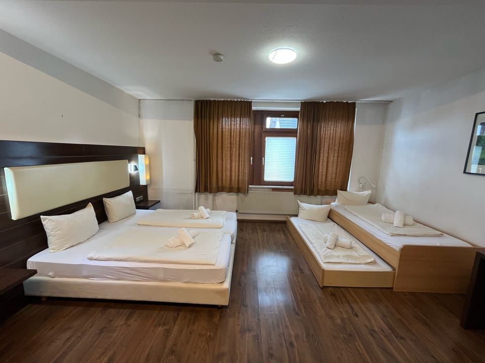 Quadruple Room | Individually furnished, desk, free WiFi, bed sheets