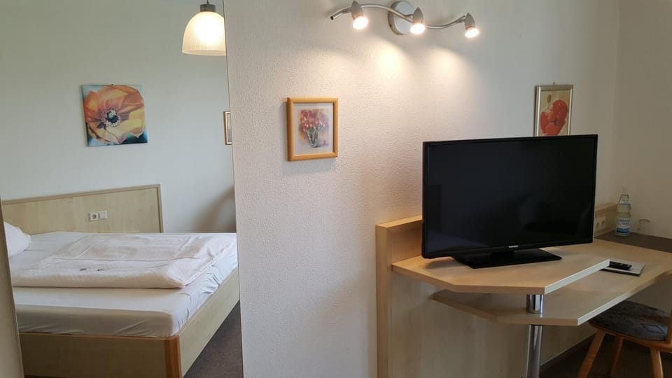 Desk, rollaway beds, free WiFi, bed sheets